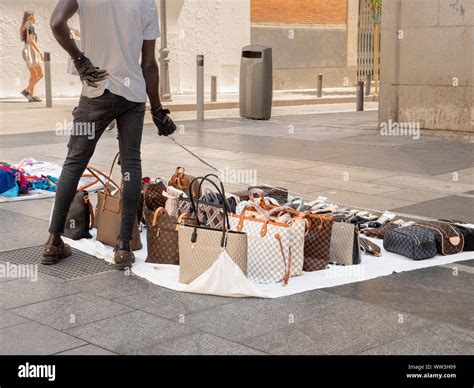 selling counterfeit handbags.